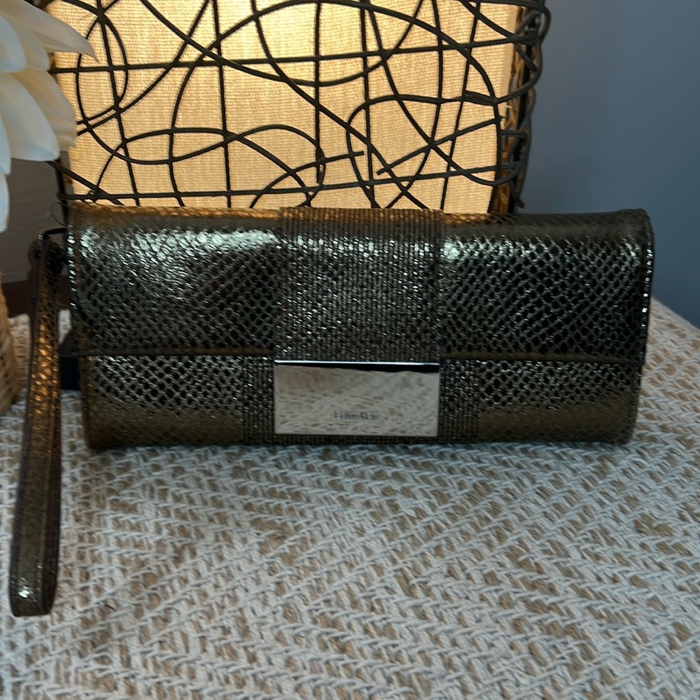 NWOT Calvin Klein Bronze Snakeskin Clutch with wristlet.